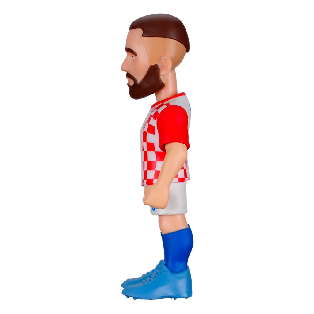 Fußballspieler-Figur mit Bart, kariertem Trikot, weißen Shorts und blauen Stiefeln