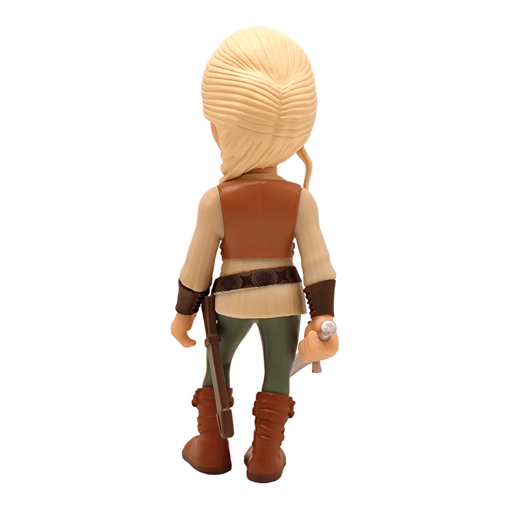 Rueckansicht einer blonden Spielfigur mit brauner Weste und gruener Hose