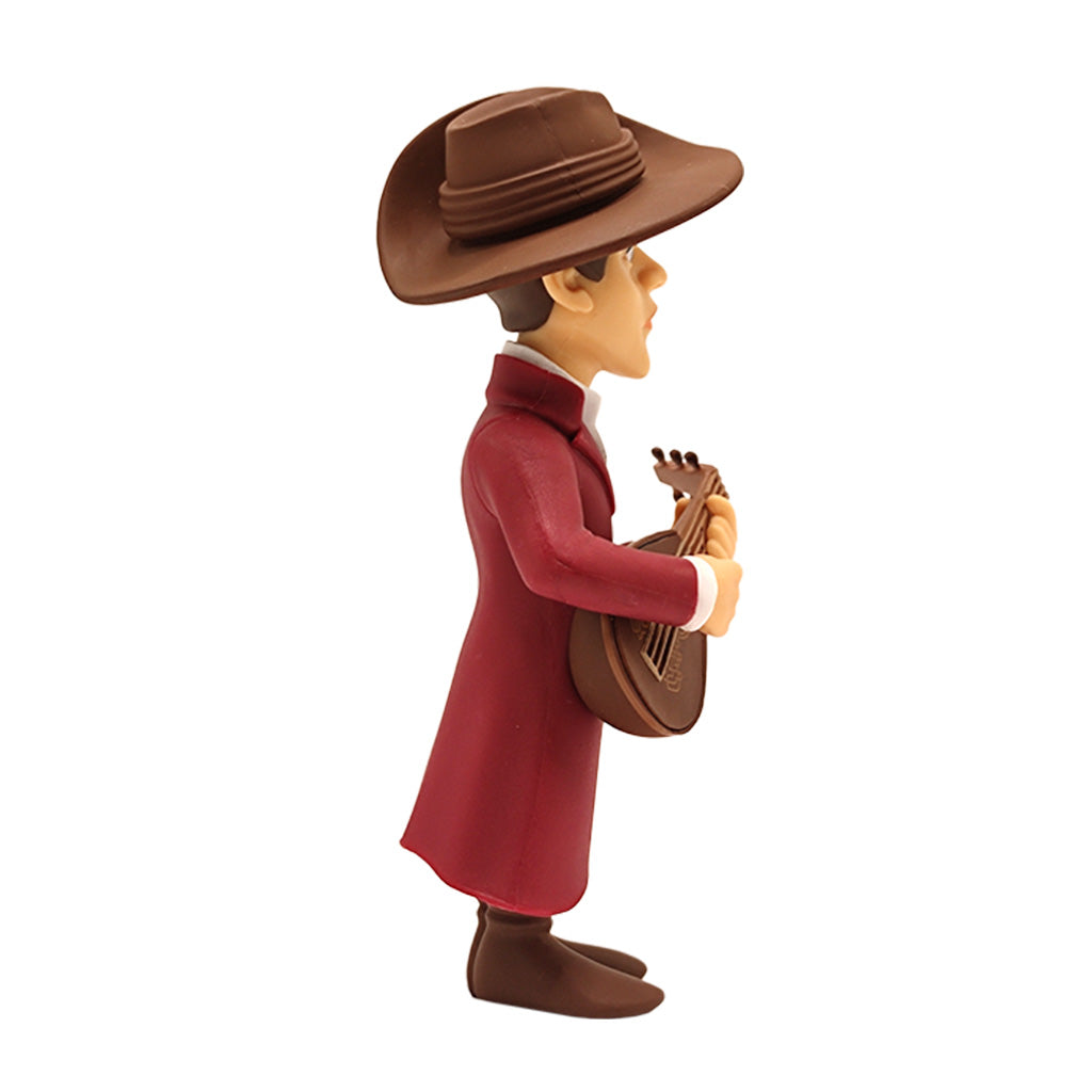 Figur eines Mannes mit Hut und rotem Mantel, der eine kleine Gitarre spielt
