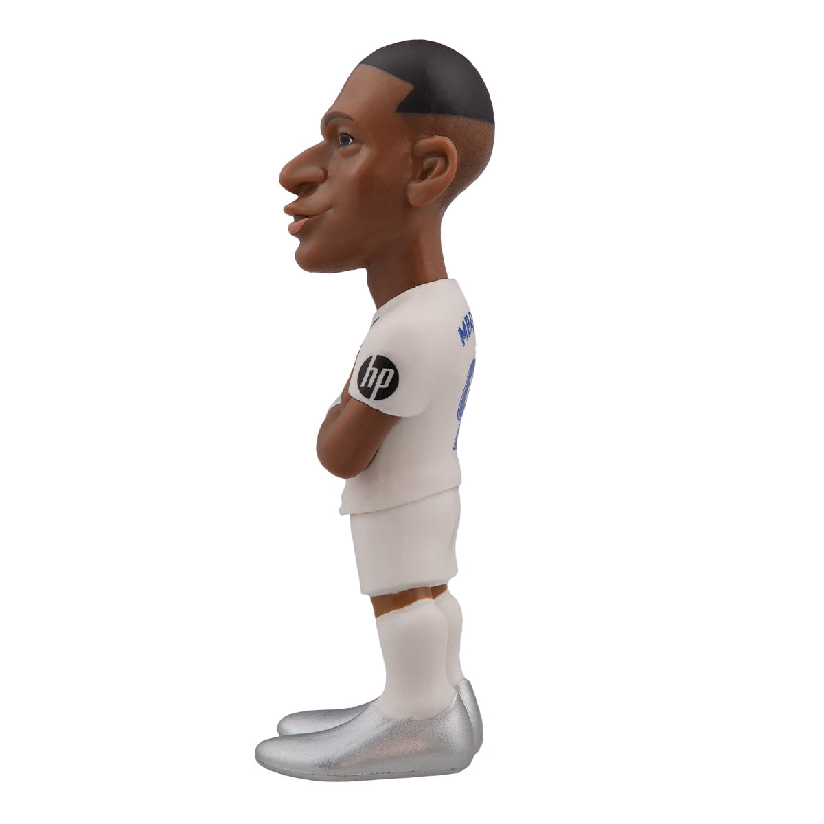 Figur eines Fußballspielers in weißem Trikot mit HP-Logo und silbernen Schuhen