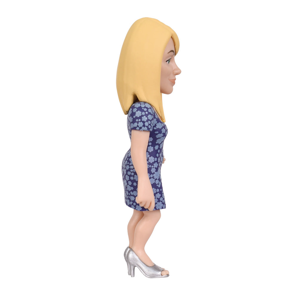 Sammelfigur einer blonden Frau im blauen Blumenkleid mit silbernen High Heels in Seitenansicht