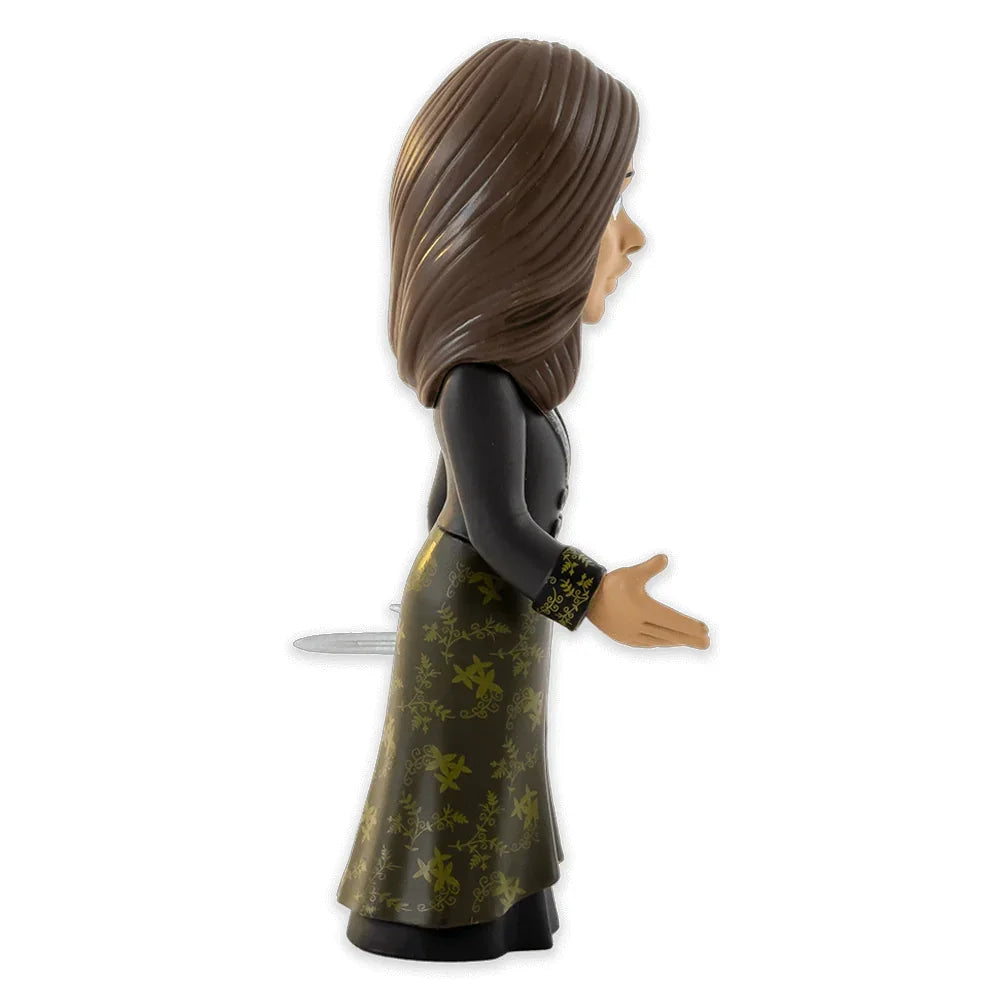 Seitenansicht einer Anna-Figur aus Die Eiskönigin mit braunen Haaren, schwarzem Oberteil und grünem Rock