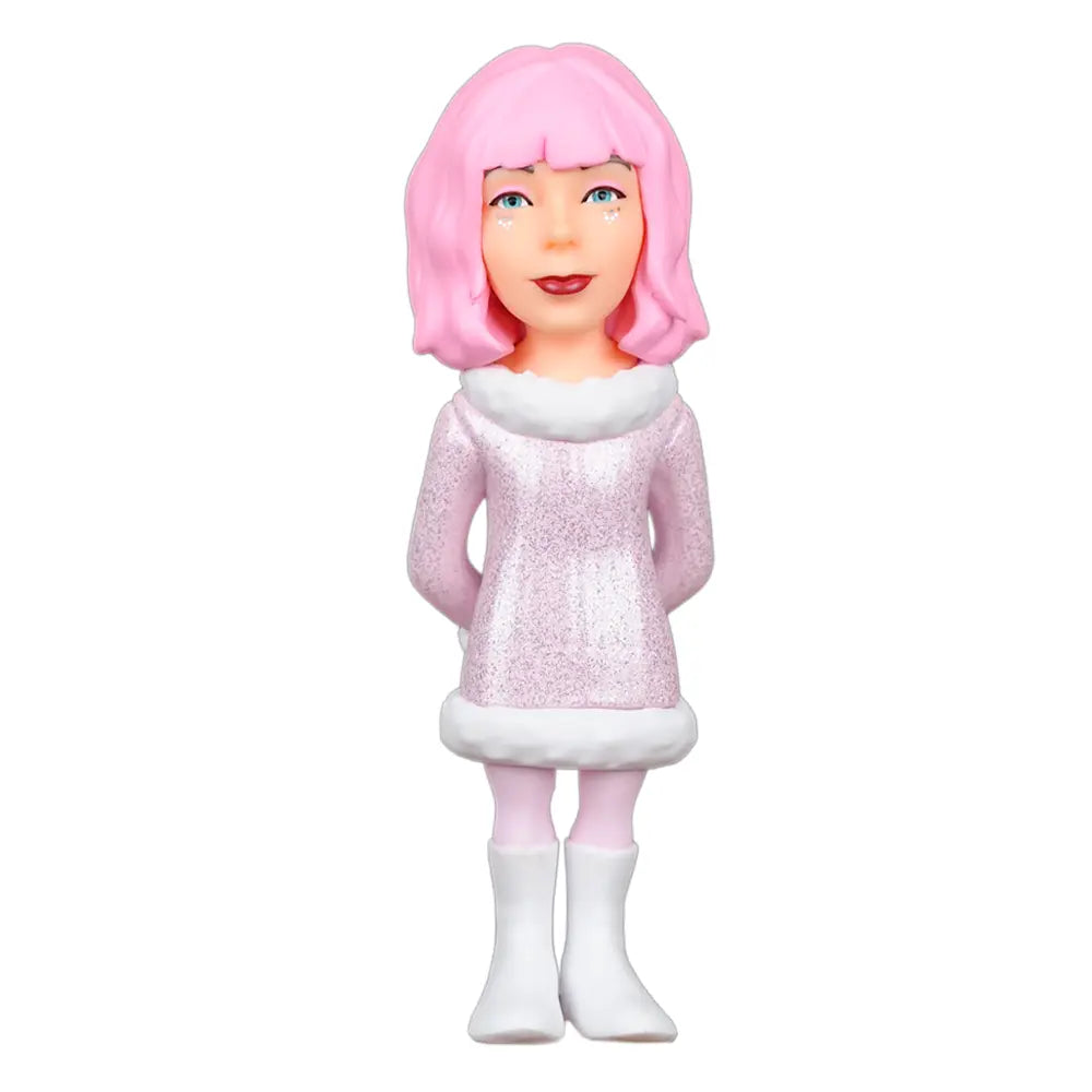 Figur einer Frau mit rosa Haaren und einem rosa Glitzerkleid mit weißem Pelzbesatz