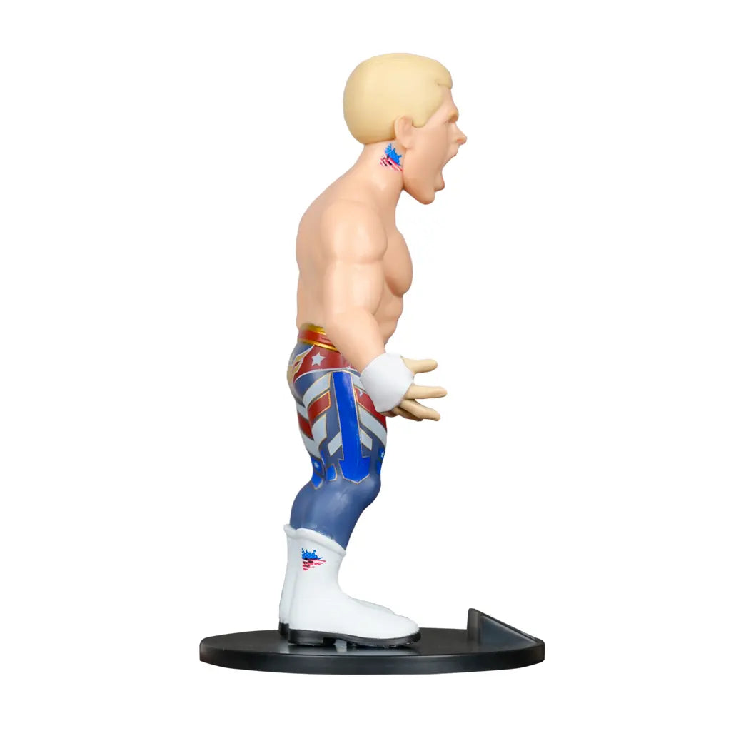 Cody Rhodes Figur mit blonden Haaren, blau-rot-weißem Outfit und Stiefeln