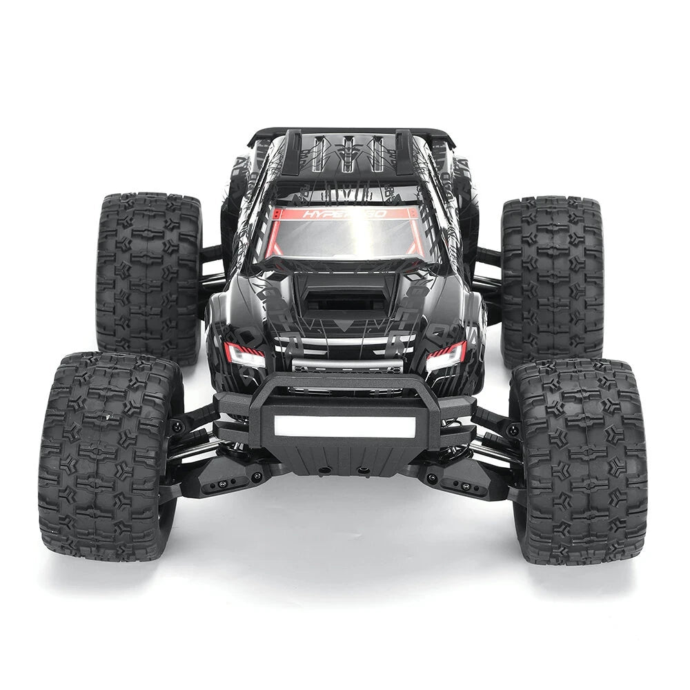 Schwarzer ferngesteuerter Monstertruck mit großen Reifen und rotem Akzent