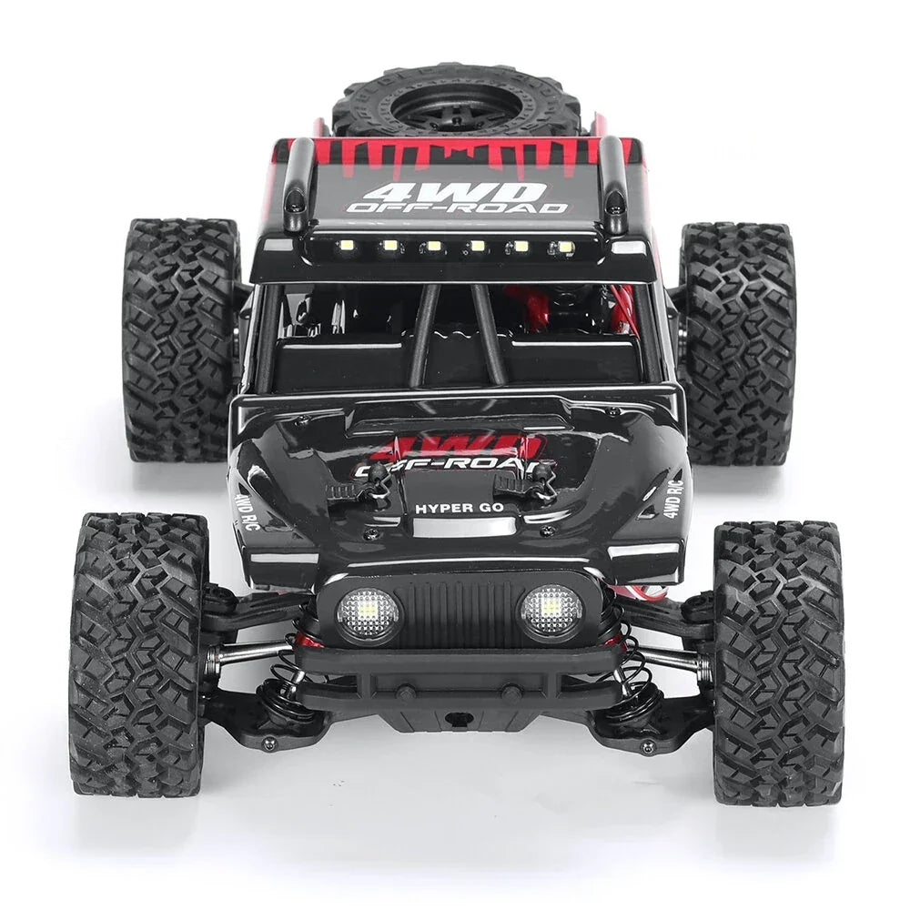 Schwarzes 4WD-Offroad-RC-Fahrzeug mit roten Akzenten und großen Reifen