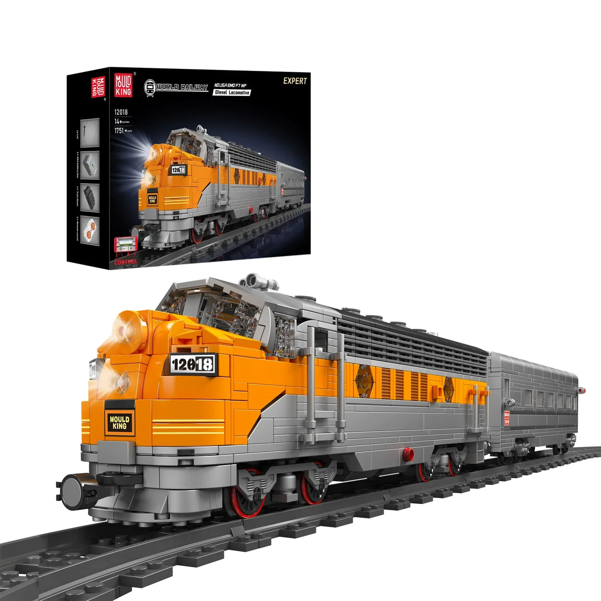 Modell eines orange-grauen Dieselzuges auf Schienen mit leuchtenden Scheinwerfern, daneben die Produktverpackung