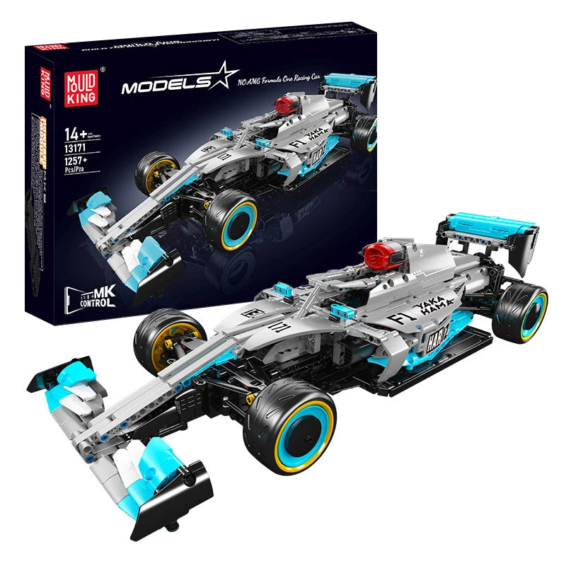 Bausatz eines Formel-1-Rennwagens in Grau und Türkis mit schwarzer Verpackung