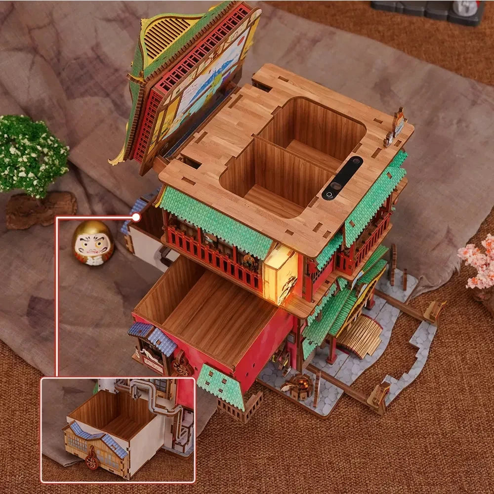Detailliertes Holzmodell eines japanischen Hauses mit mehreren Ebenen und Schiebeelementen