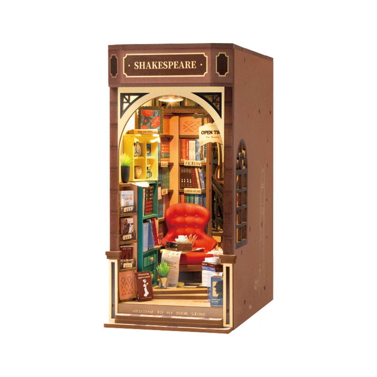 Miniatur Buchladen Modellbausatz mit Regalen und rotem Sessel