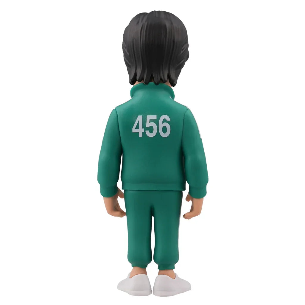 Rückansicht einer Figur in einem grünen Trainingsanzug mit der Nummer 456 auf dem Rücken