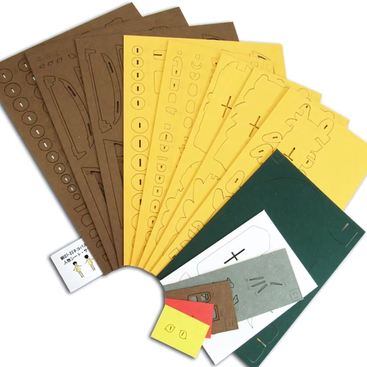 Bastelset mit braunen, gelben, grünen, grauen, roten und weißen Papierbögen