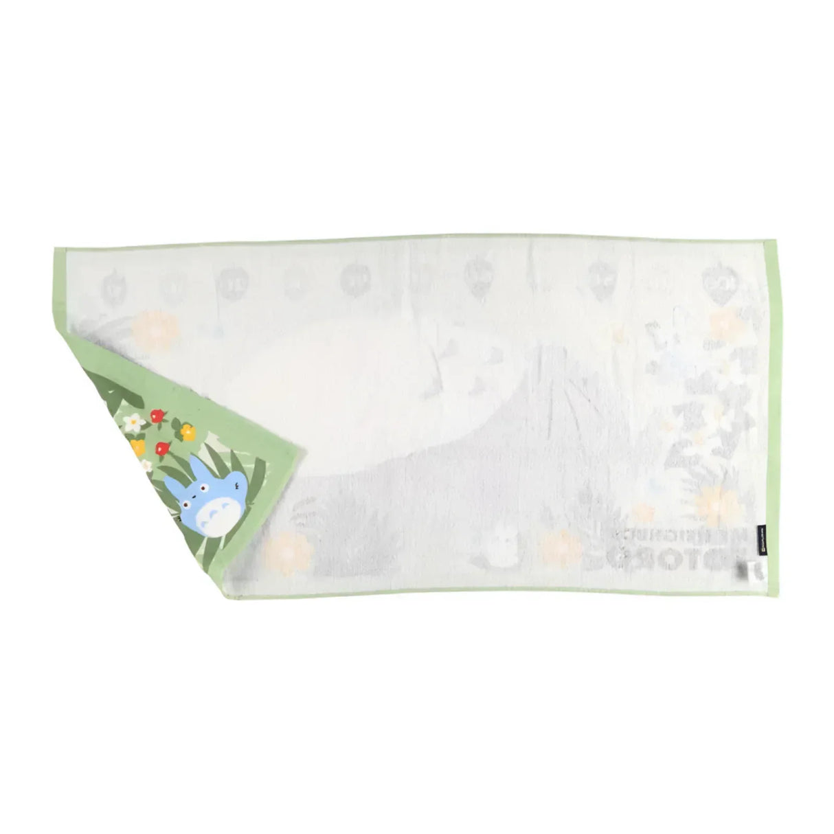 Handtuch mit Totoro Motiv und Blumenmuster in Grün und Weiß