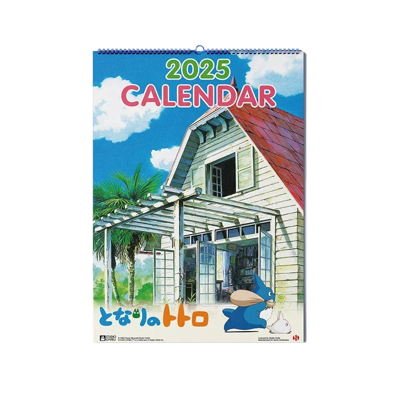 Wandkalender 2025 mit einer Illustration eines Hauses und Totoro Figuren
