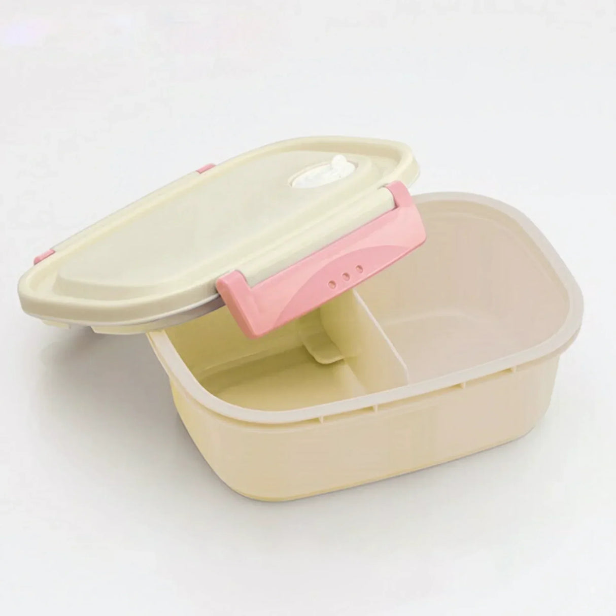 Beige Lunchbox mit rosa Verschluss und offenem Deckel