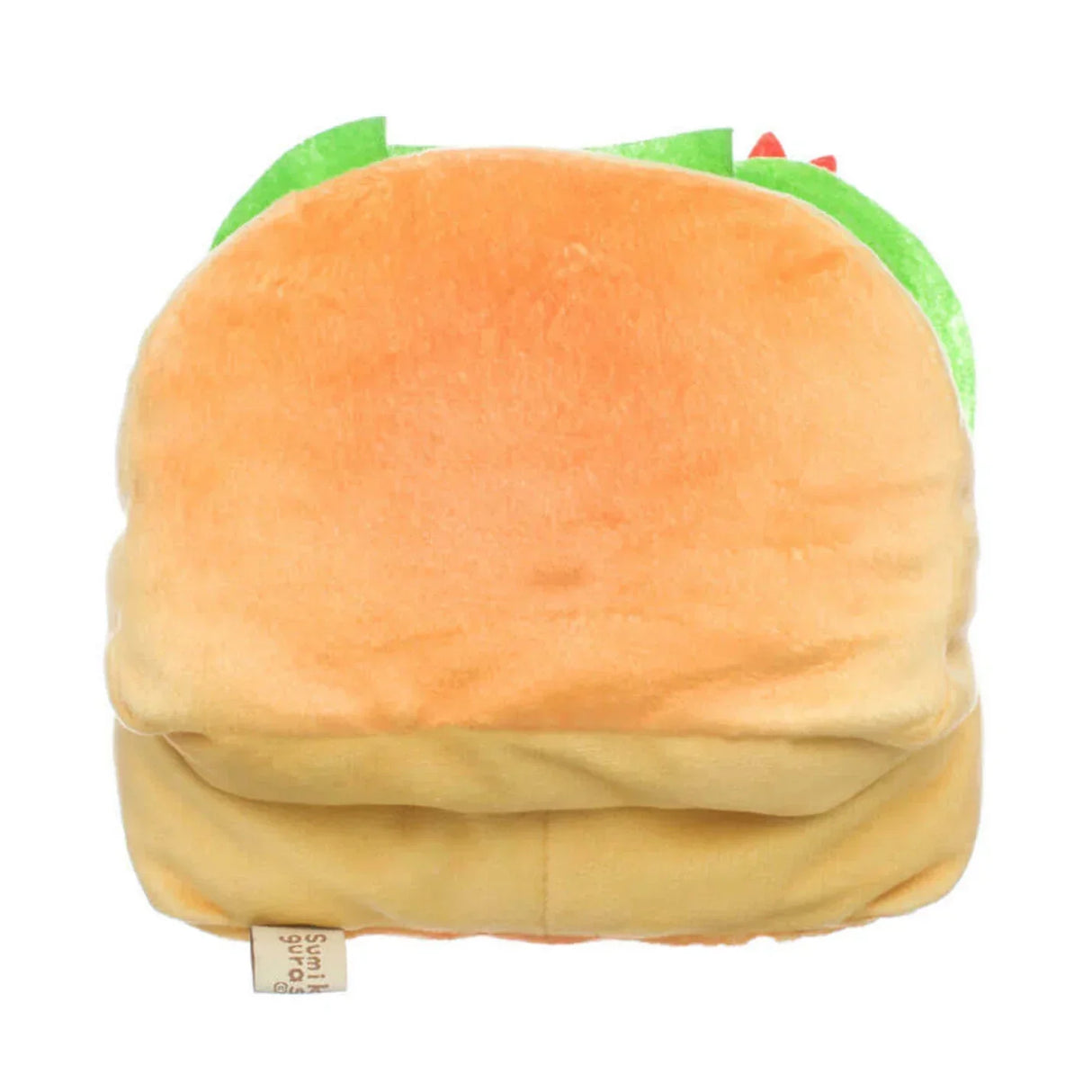 Plüschtier in Form eines Burgers mit grünem Salat und rotem Belag