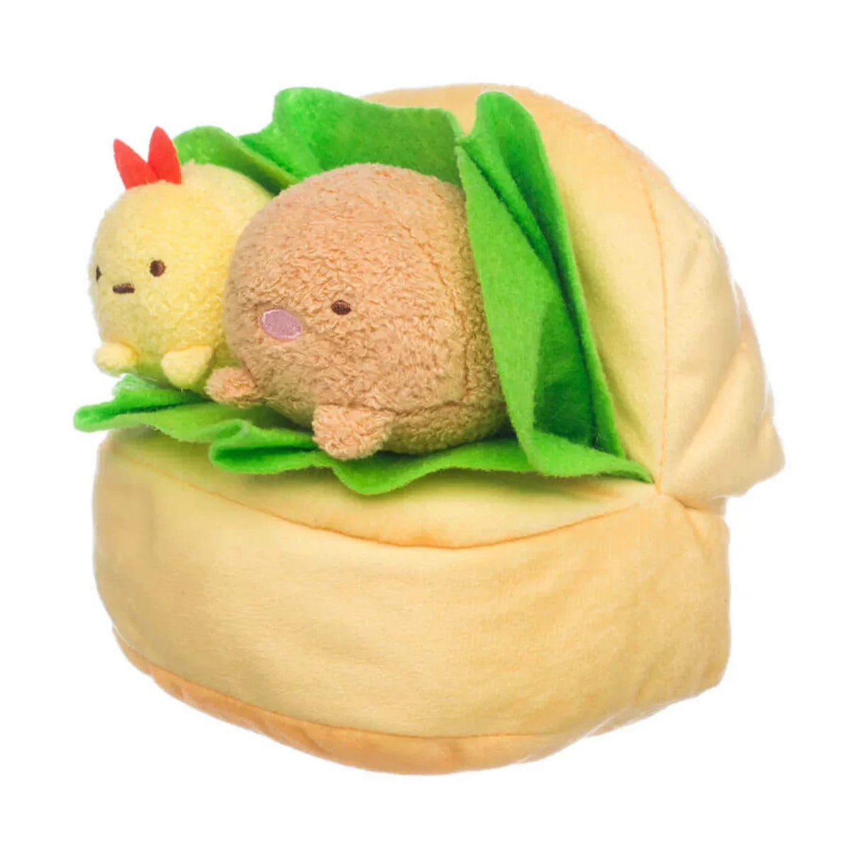 Plüschtier in Form eines Sandwiches mit zwei kleinen Figuren auf einem Salatblatt
