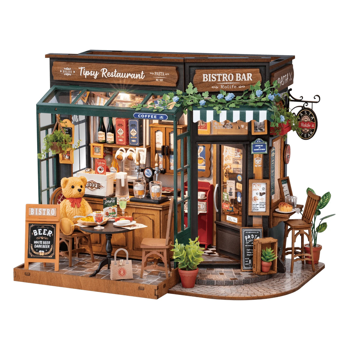 Miniatur-Restaurant mit Teddybär am Tisch, Bierhähnen und Menütafeln