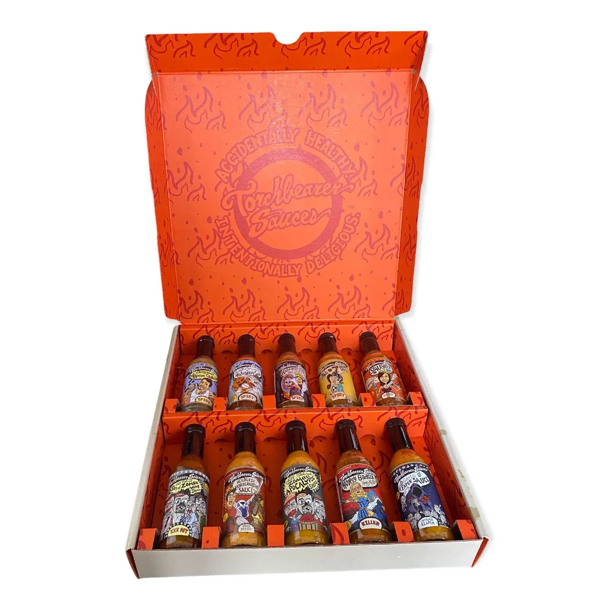 Zehn Flaschen Torchbearer Saucen in einer orangefarbenen Geschenkbox