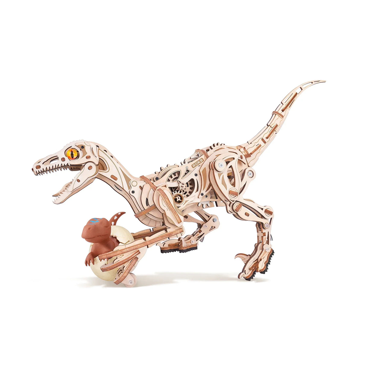 Holzmodell eines Velociraptors mit einem Baby-Dinosaurier in einem Ei