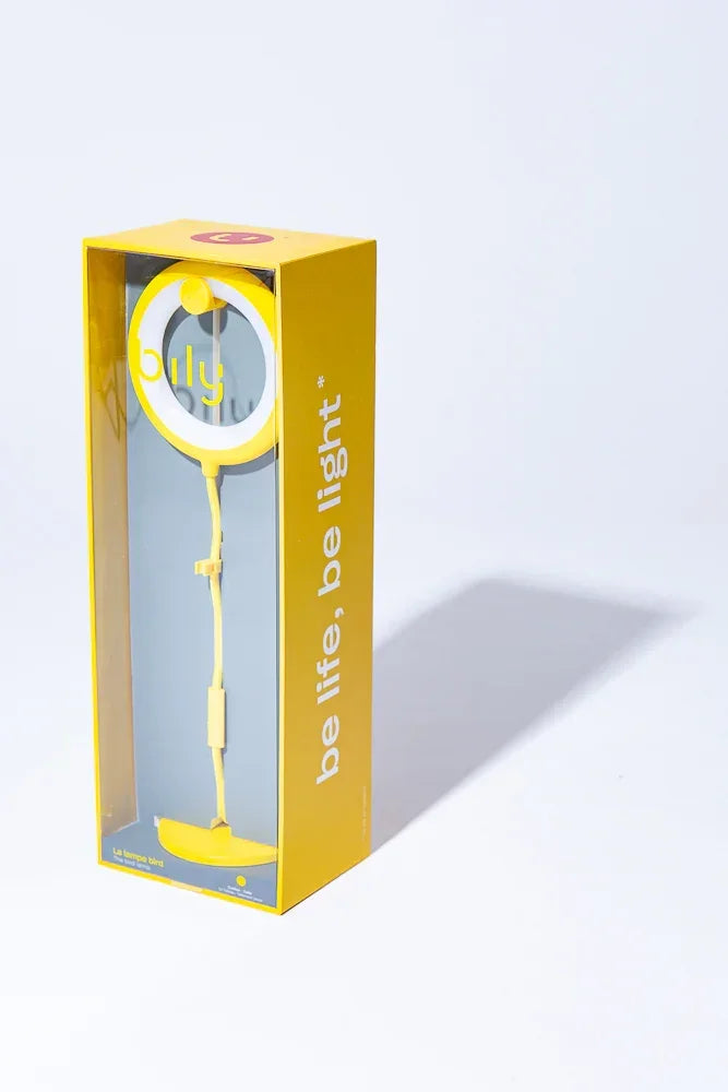 Gelbe Verpackung mit einer runden LED Leuchte auf einem Ständer