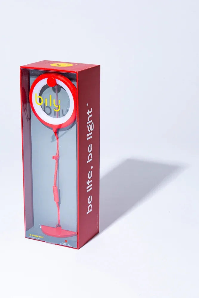 Rote Verpackung mit einer runden LED Leuchte und Kabel