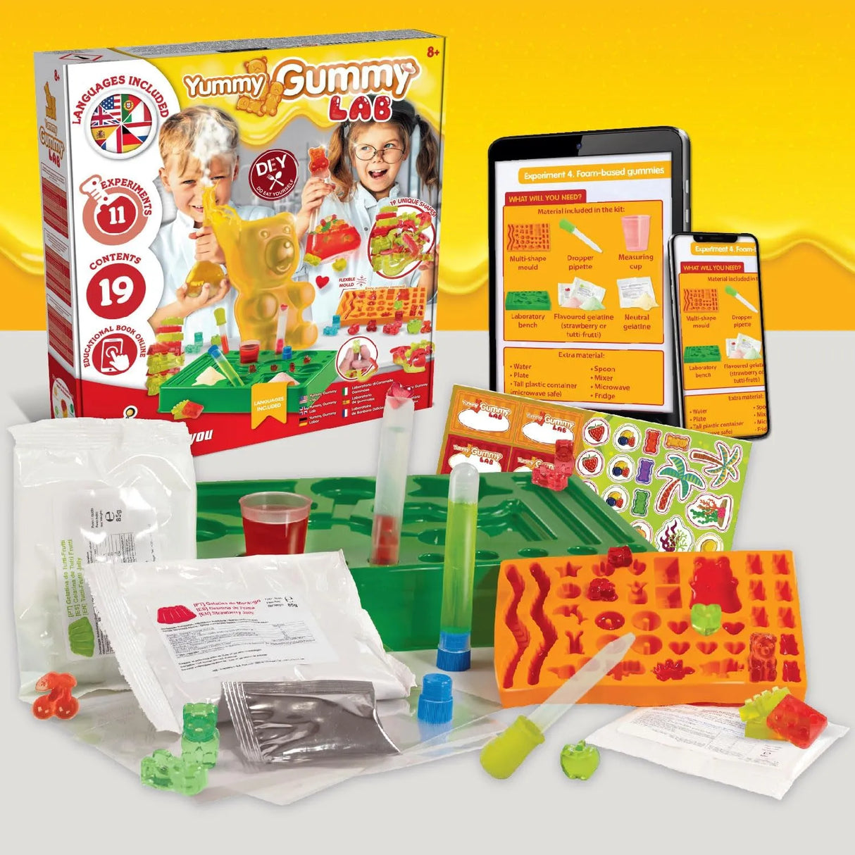 Yummy Gummy Lab Set mit Gummibärchen, Formen, Zutaten und Anleitungen auf Tablet und Smartphone