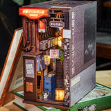Miniaturmodell einer japanischen Gasse im Shinjuku Stil als Buchstütze
