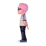 Sammelfigur mit rosa Haaren und Brille in Seitenansicht