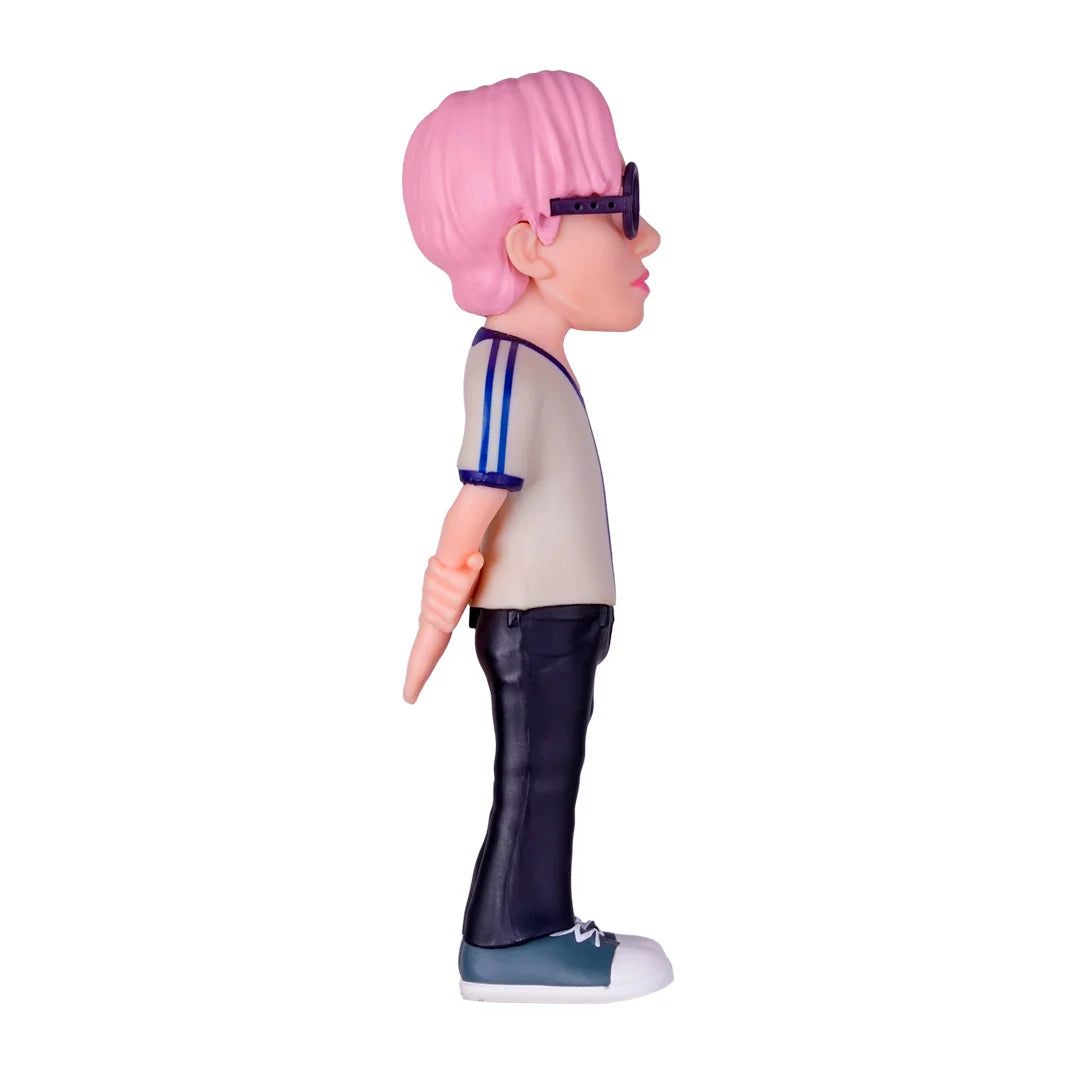 Sammelfigur mit rosa Haaren und Sonnenbrille in Seitenansicht